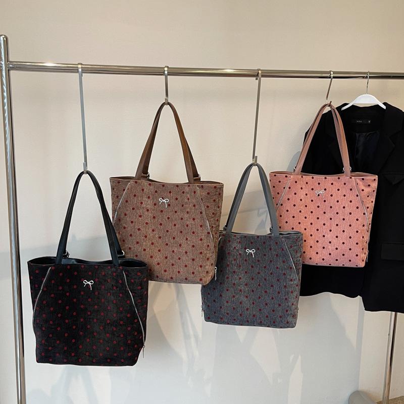 2025 autumn and winter new large-capacity polka dot backpack texture commuter tote bag cute bow shoulder oblique span bag