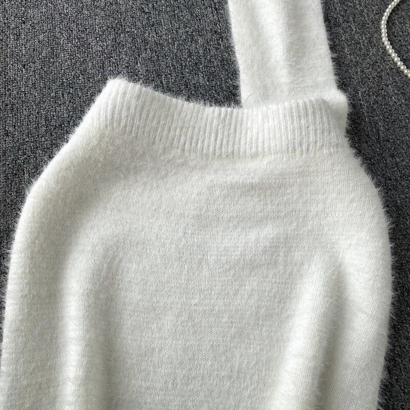 Autumn And Winter Fashion Short Long-Sleeved Knitted Sweater + Hip Short Skirt Two-Piece Set