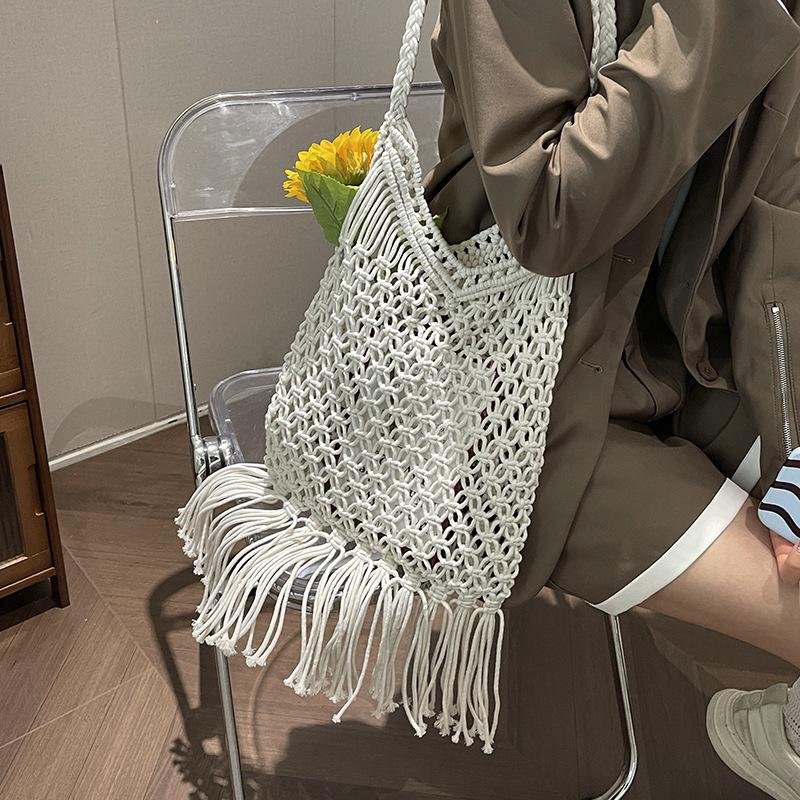 Hollow Cotton Thread Woven Bag 2025 New Single Shoulder Tassel Straw Bag Vacation Wind Beach Bag Versatile Underarm Women's Bag