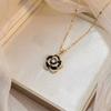 Korean Style Rotating Clover and Heart Pendant Necklace with Titanium Steel Chain