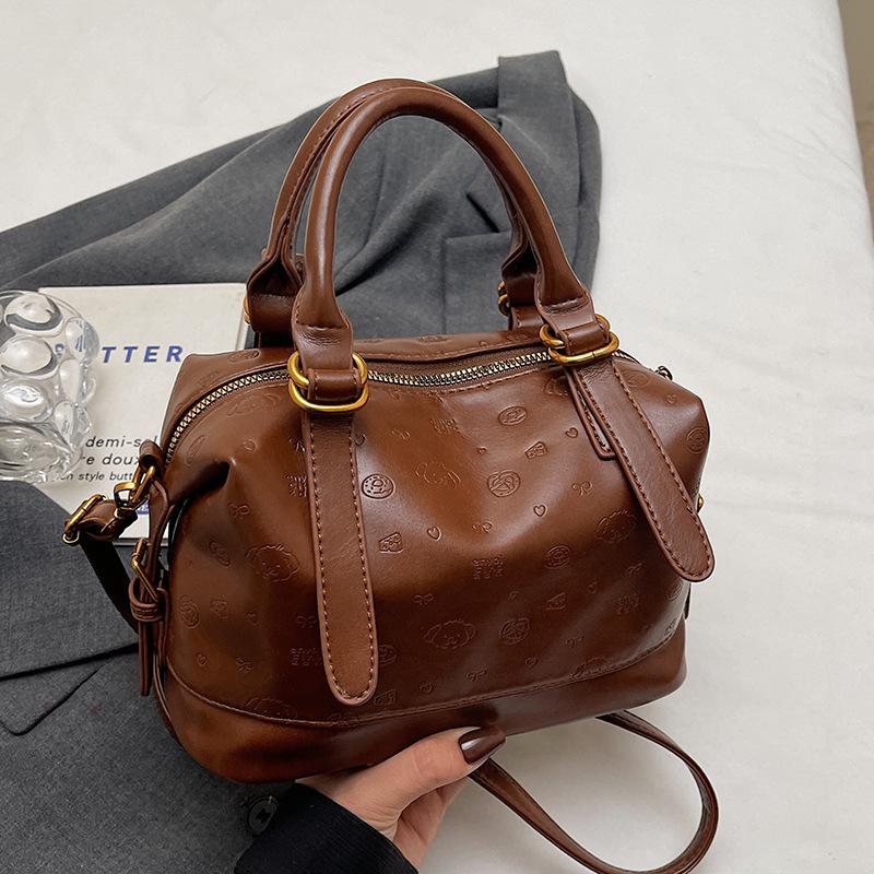 

Новый продукт модная корейская версия чувство высокого класса персонализированный принт нишевая портативная сумка-подушка универсальная сумка-мессенджер из мягкой кожи для通勤 wo