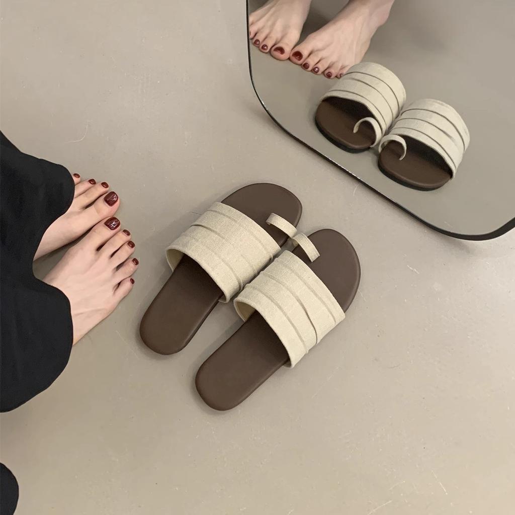 Holiday wind cover toe flat slippers women's outer wear summer 2025 new casual one-word drag temperament beach women's shoes