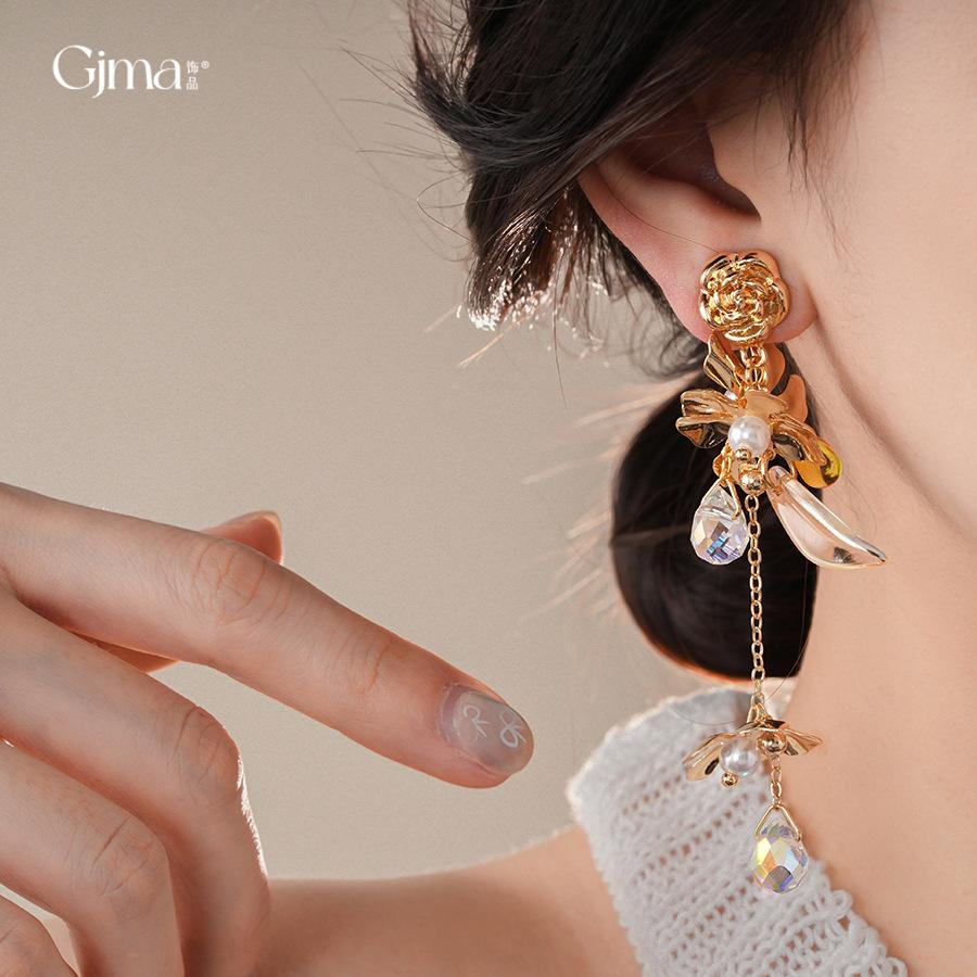 Silver needle flower pearl water drop fringed earrings earrings European and American niche exaggerated earrings women