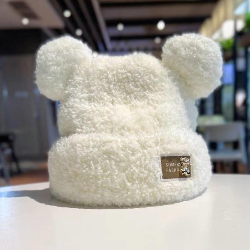 Autumn and winter thickened soft waxy warm cold ear protection cold hat metal cute bear plush knitted versatile model