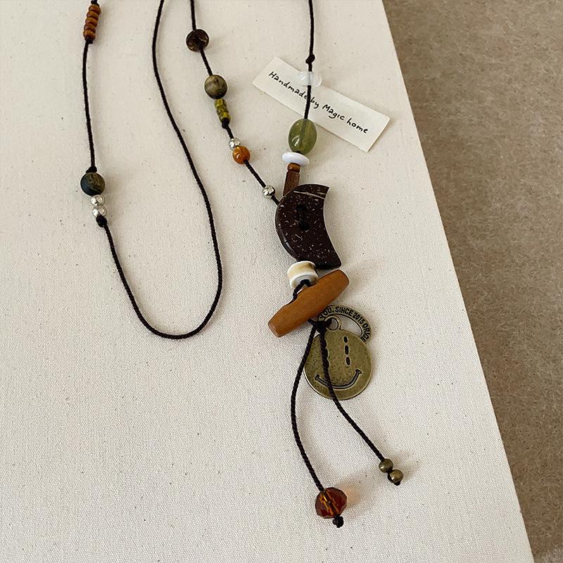 Retro Ethnic Style Crescent Moon Smiley Face Black Rope Long Necklace Women'S Light Luxury Temperament Elegant Versatile Neck Chain Sweater Chain