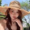 Elegant Raffia Sun Hat With Wide Brimmed And Breathable Openwork Design For Beach Vacation And Outdoor Activities