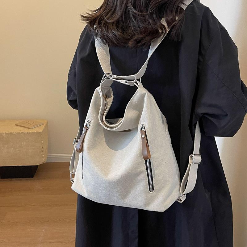 Double zipper shoulder bag New canvas Large capacity simple casual oblique span bag Multifunctional commuter backpack