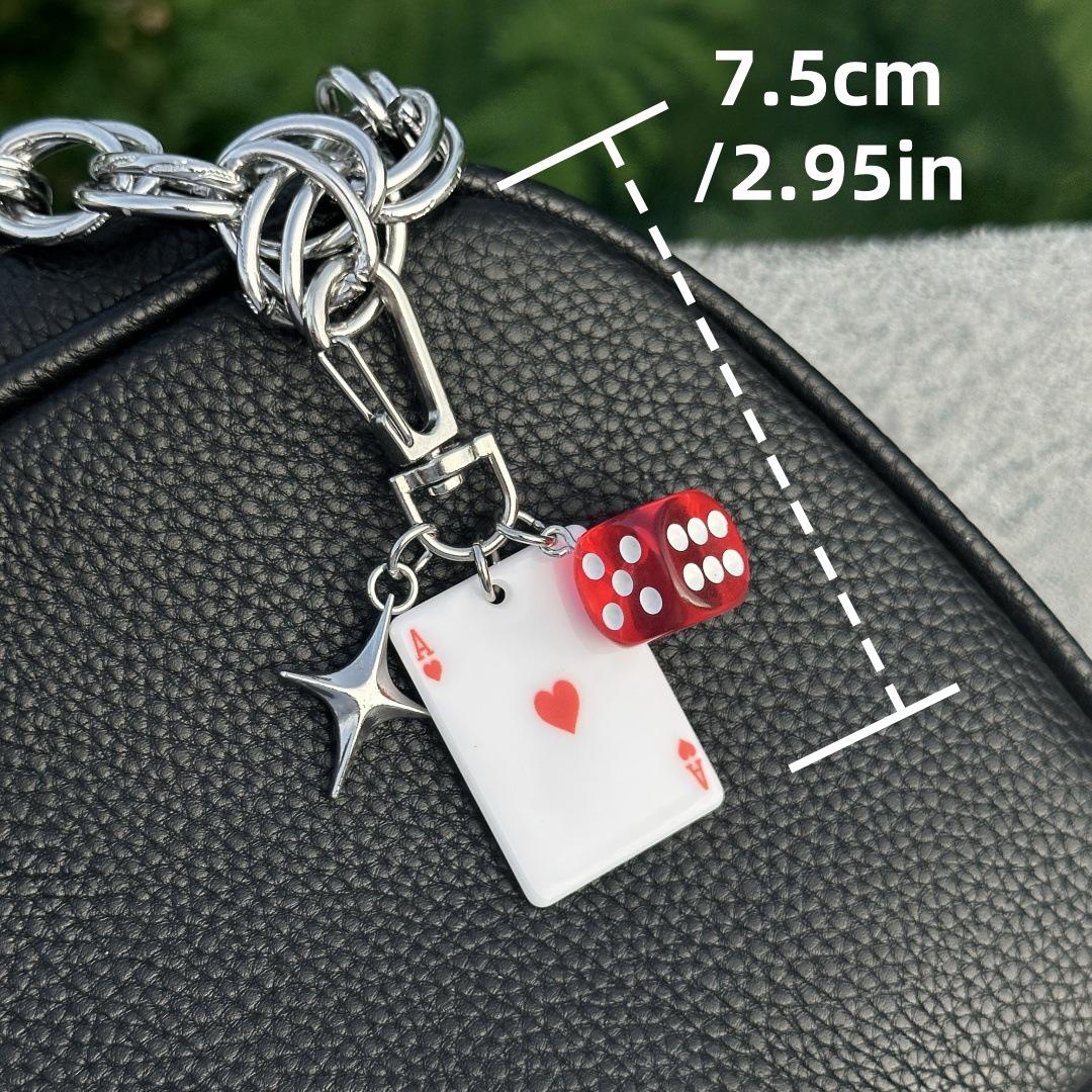 

Брелок-шарм Ainsworth Poker God з кількома елементами та прикраса на пояс