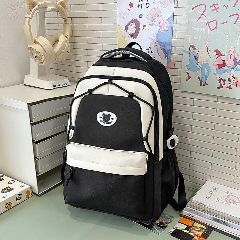 New Decompression Large Capacity Schoolbag Junior High School Girls and Senior High School Students Light Campus Backpack.