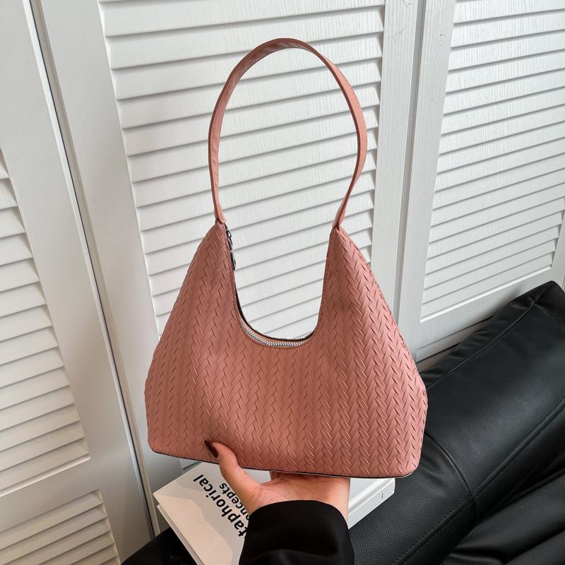 

Niche design portable dumpling bag women s 2025 new summer high-end texture versatile foreign style shoulder messenger bag розовый