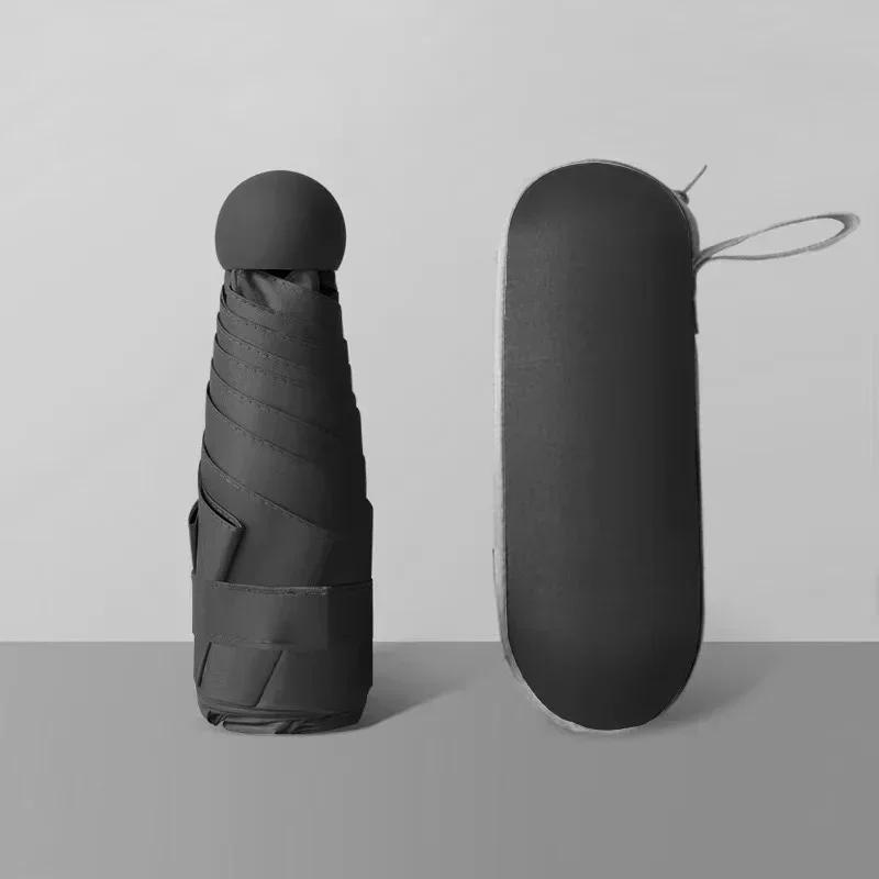 Umbrelă cu capsulă Mini umbrelă portabilă de protecție solară Umbrelă de ploaie Mâner din aliaj de cauciuc negru Pliabil Soare Ploaie Utilizare dublă