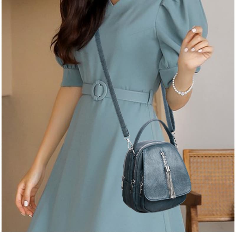 Versatile soft leather portable shoulder messenger bag change bag