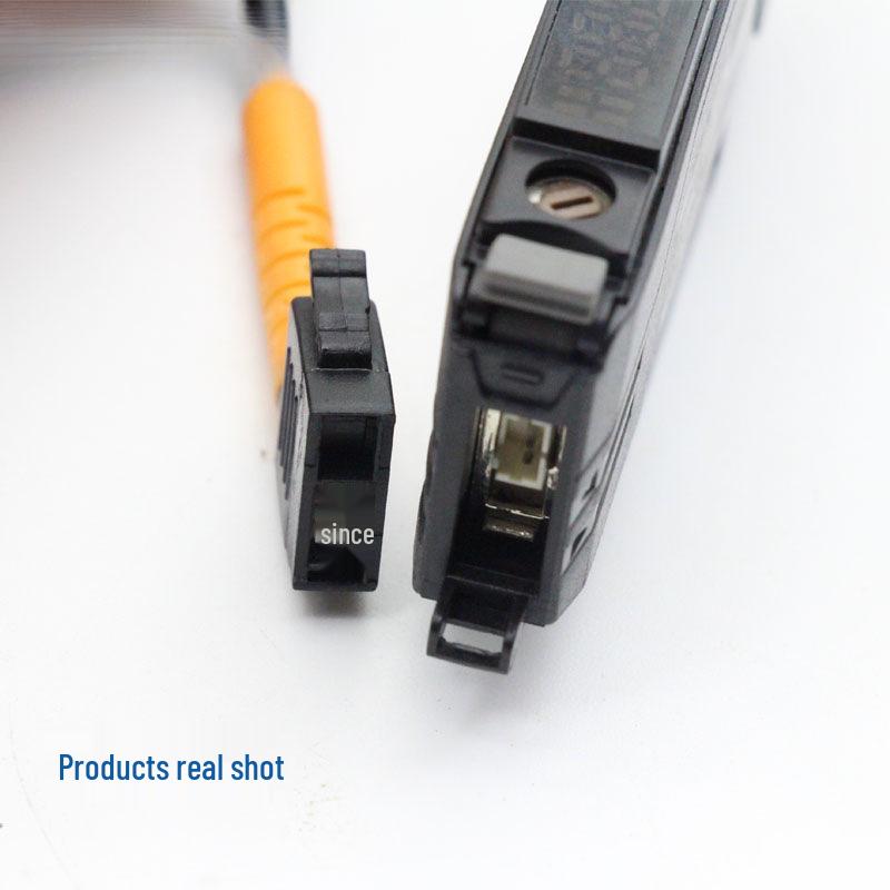 Ring-Shaped Fiber Optic Sensor for Metal/Non-Metal Detection Without Blind Spots