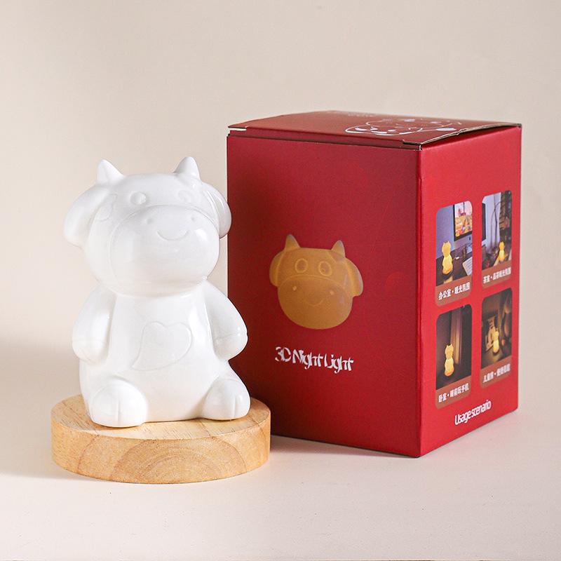 Internet celebrity ceramic atmosphere night light cute little cow led light household bedroom bedside children's room lamp