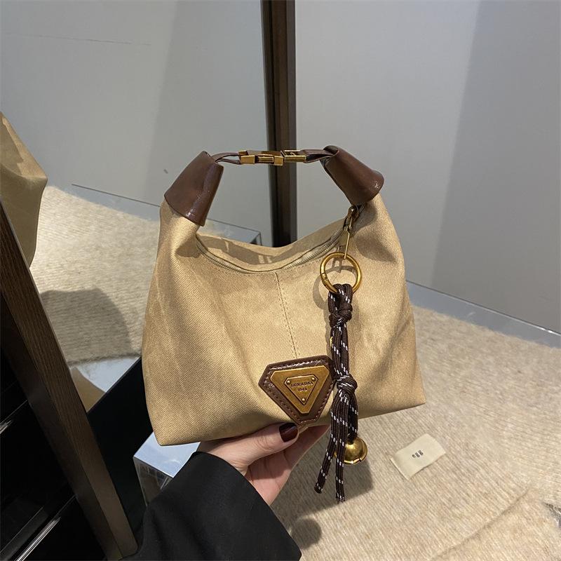 

Hand bag women s new fashionable retro tote bag niche texture casual shoulder messenger bag Without pendant хакі