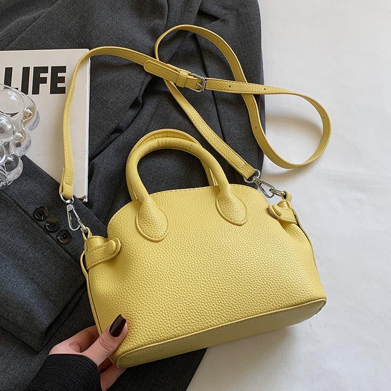 

Весна и лето популярная корейская версия нишевая милая сумка-ракушка с узором личи, модный простой стиль, универсальная сумка-мессенджер для通勤