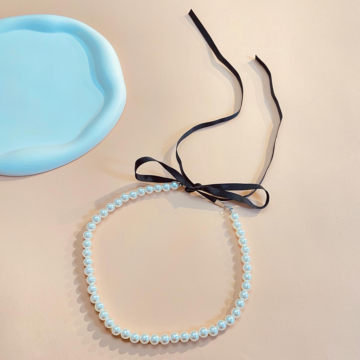 

High quality 2026 jewelry retro court beaded necklace temperament imitation pearl flannel fringed necklace sexy accessories women