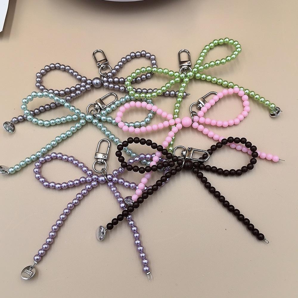Portachiavi con Ciondolo a Forma di Fiocco d'Amore Placcato Argento per Telefoni - Raffinato Piccolo Accessorio Regalo