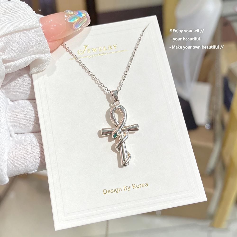 Retro Snake Cross Necklace for Women: Luxury Clavicle Chain, Hip Hop Choker Design, Fashionable & Personalized.