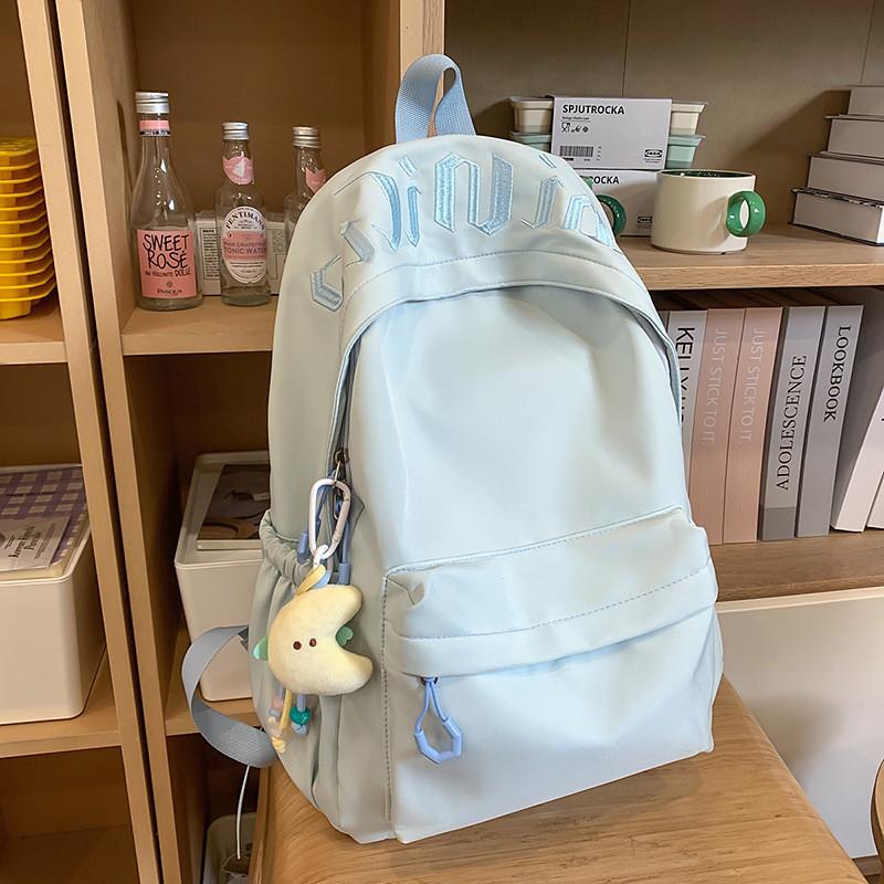 

Nylon Large Capacity Travel Backpack With Embroidery For Middle School Students синій