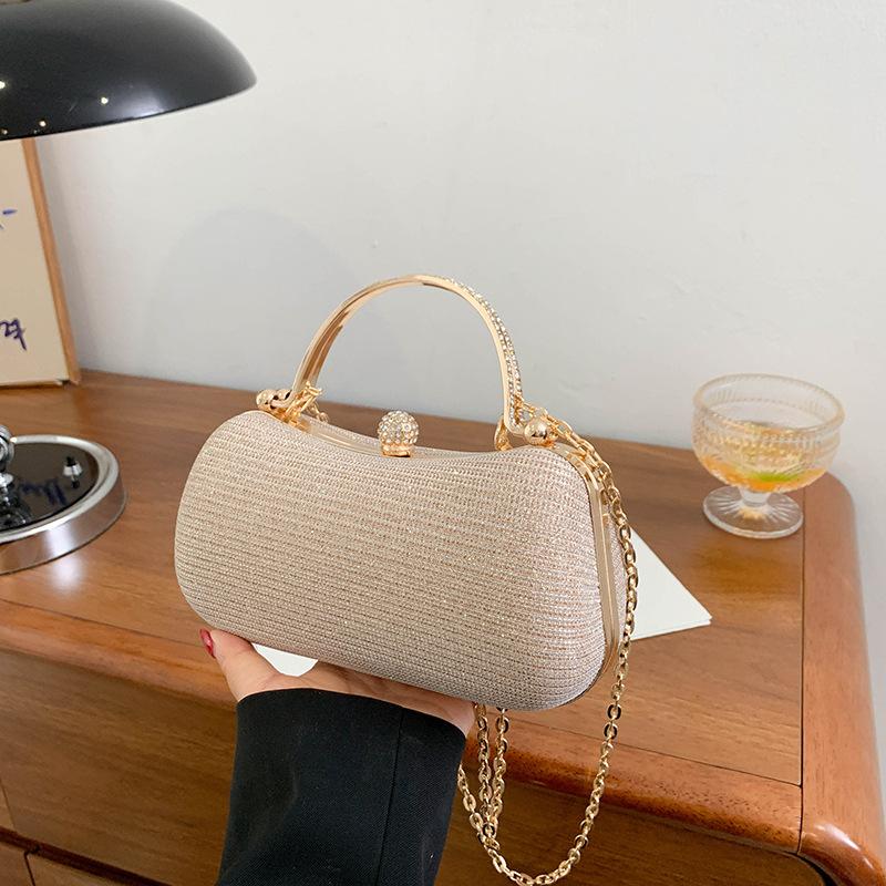 

ins chain mobile phone small bag women s diamond-encrusted rhinestone hand-held small square bag niche one-shoulder messenger dinner bag золотий