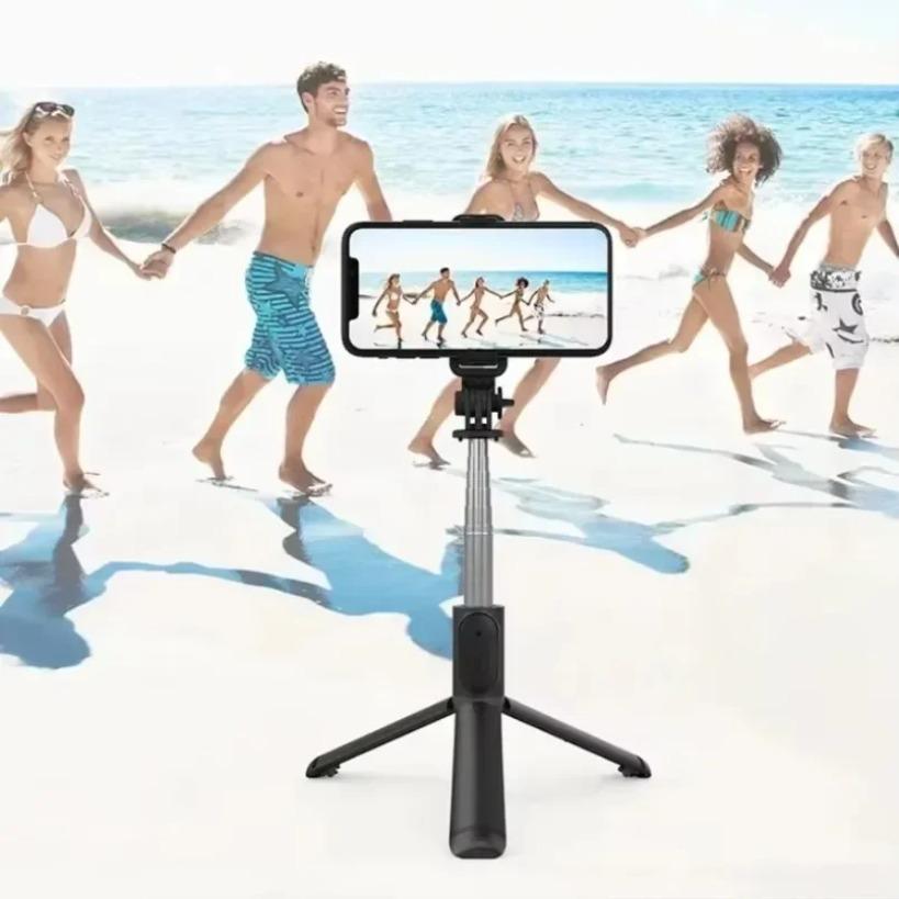 Multifunctional Bluetooth selfie stick with wireless remote and extendable desktop tripod phone stand for smartphones
