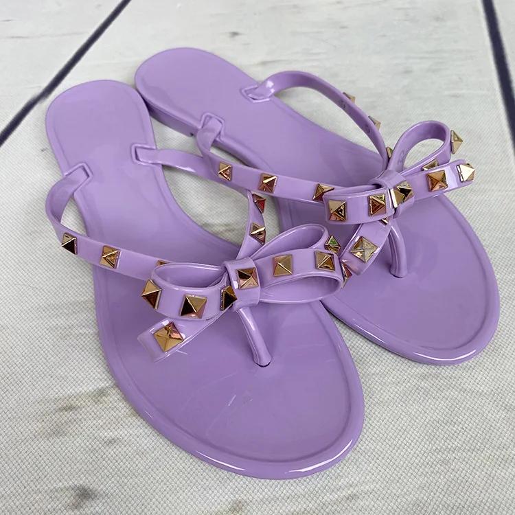 Fashion Woman's Sandals Flats Fashion Woman Flip Flops Summer Slippers Cool Beach Rivets Bowknots Flats Jelly Shoes PVC