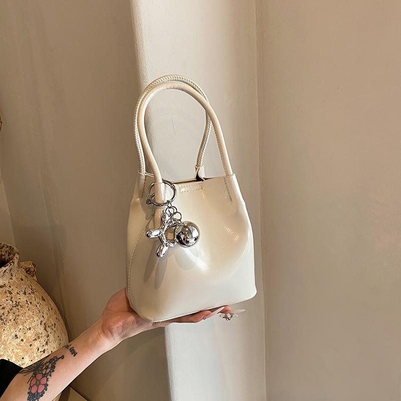 

Высококачественная серебряная сумка-ведро для женщин 2024 года, новая летняя универсальная сумка-мессенджер, модная супер популярная сумка белый