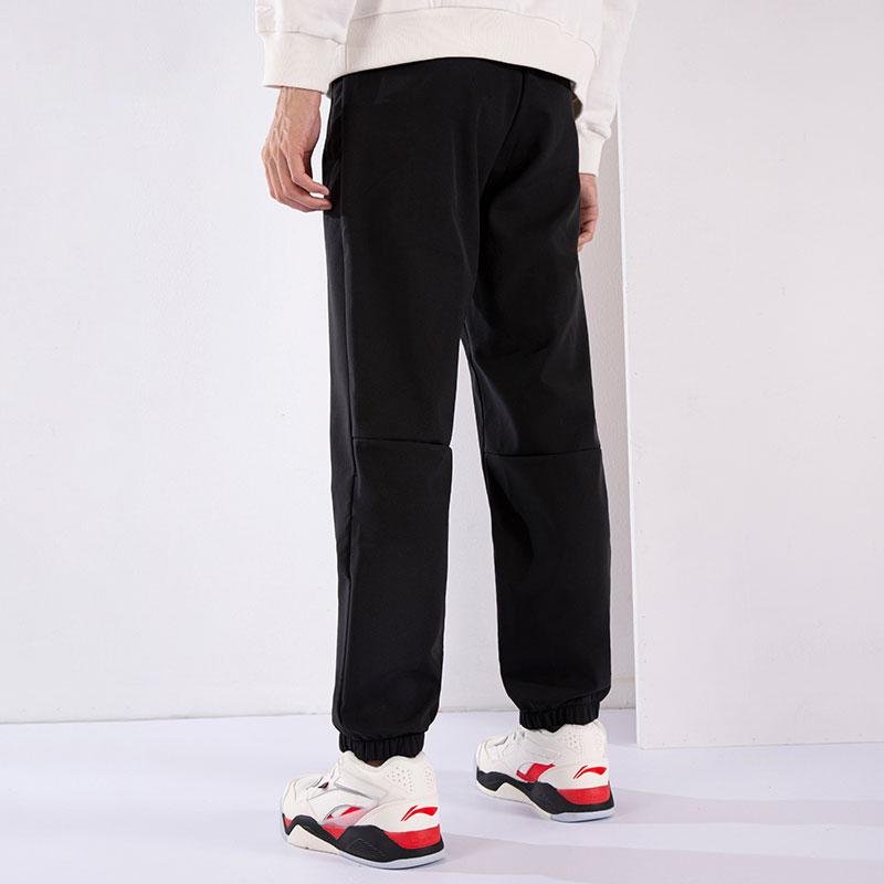 Li Ning Sports Lifestyle Series Solid Color Regular Fit Zipper Pocket Waist Elastic Cuff Knitted Sweatpants Men Bottoms Black AYKSC71-1