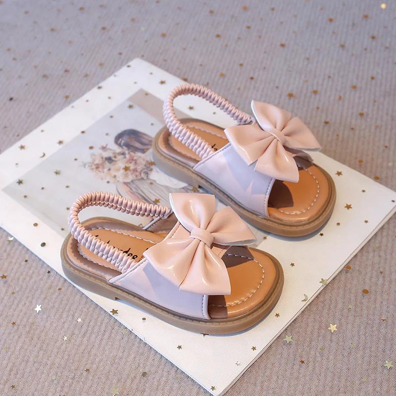 

Baby Girls Summer Beach Shoes with Sweet Bowtie Kids Flat Sandals Butterfly-knot Elastic Band Soft Open Toes Fashion 2025 New 21 розовый