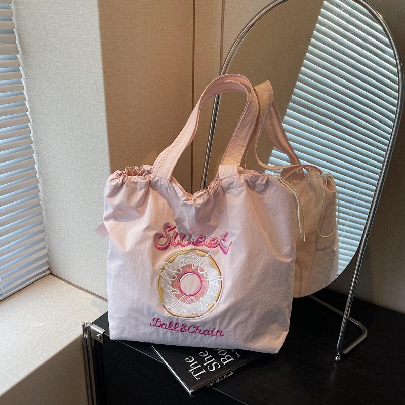 

Lazy wind new large-capacity bag women s shoulder bag drawstring student class tote bag розовый