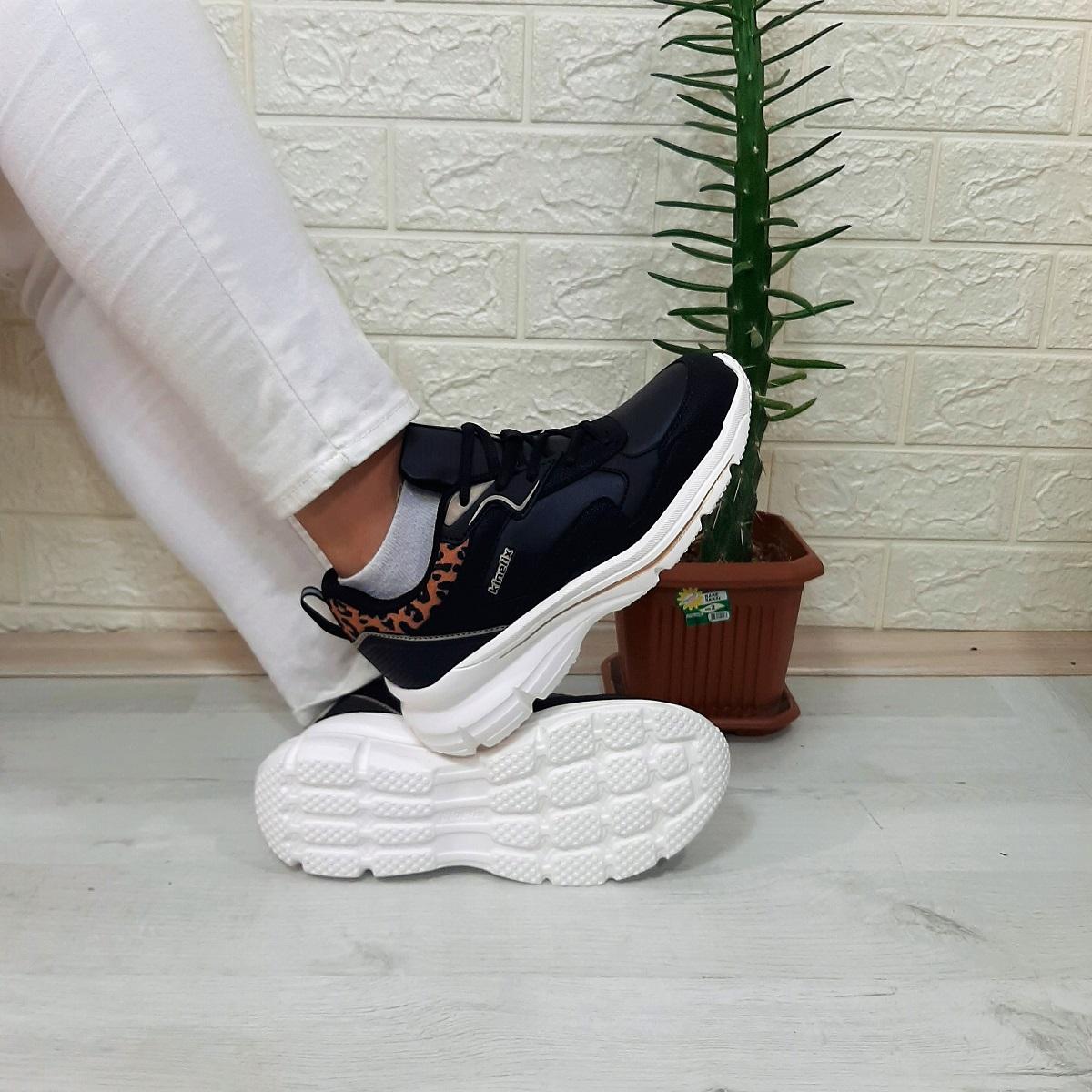 

Kinetix Черные женские спортивные туфли на танкетке Melly Pu Fuspet 38 чёрный