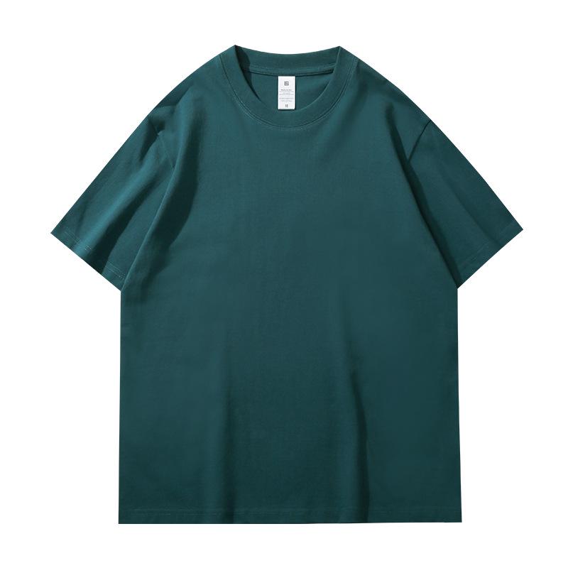 T-shirt bianca girocollo larga da 230g in puro cotone pesante con design versatile e logo stampato personalizzato.