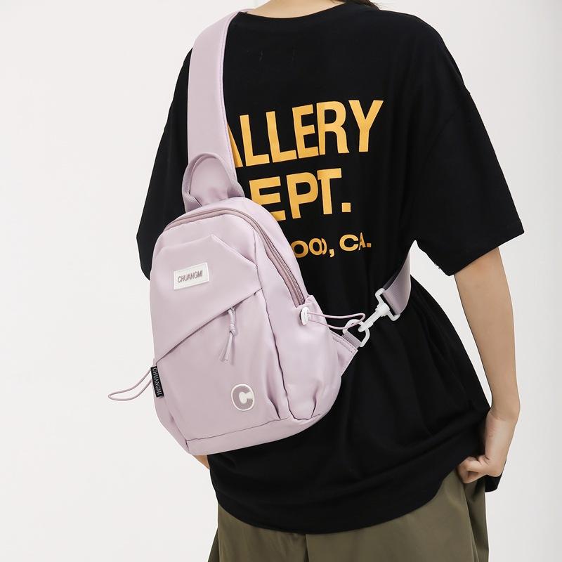 Breast bag Female trendy student versatile messenger backpack Large capacity leisure travel One shoulder Unisex chest bag