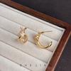Knot diamond high-end temperament earrings niche design fashionable personalized earrings simple light luxury kink earrings women