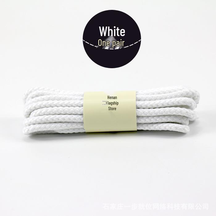 Martin Høy-Topp Militærstøvler i Skinn: Britisk hverdagsklær med runde svarte og hvite skolisser.