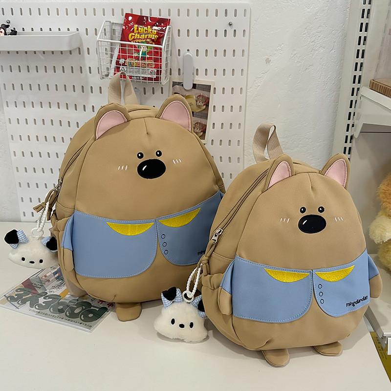 Mochila Escolar Leve de Nylon com Design de Cachorro Cartoon Fofo e Pingente de Pelúcia