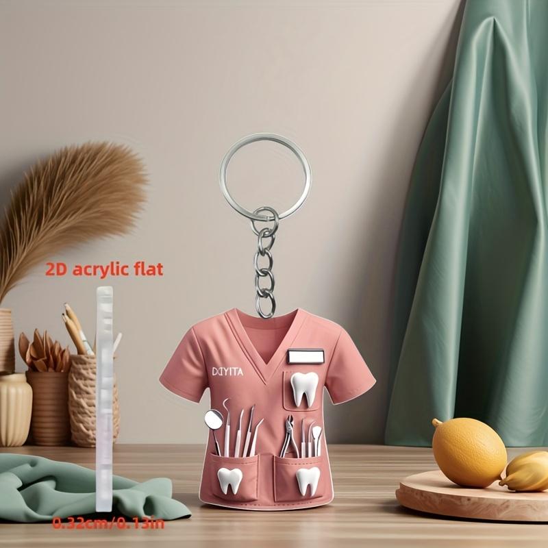 2D Acrylic Dentist Keychain Charming Pink Costume Design with Dental Tools, Waterproof Acrylic, Ideal Gift for Female Dental Professionals