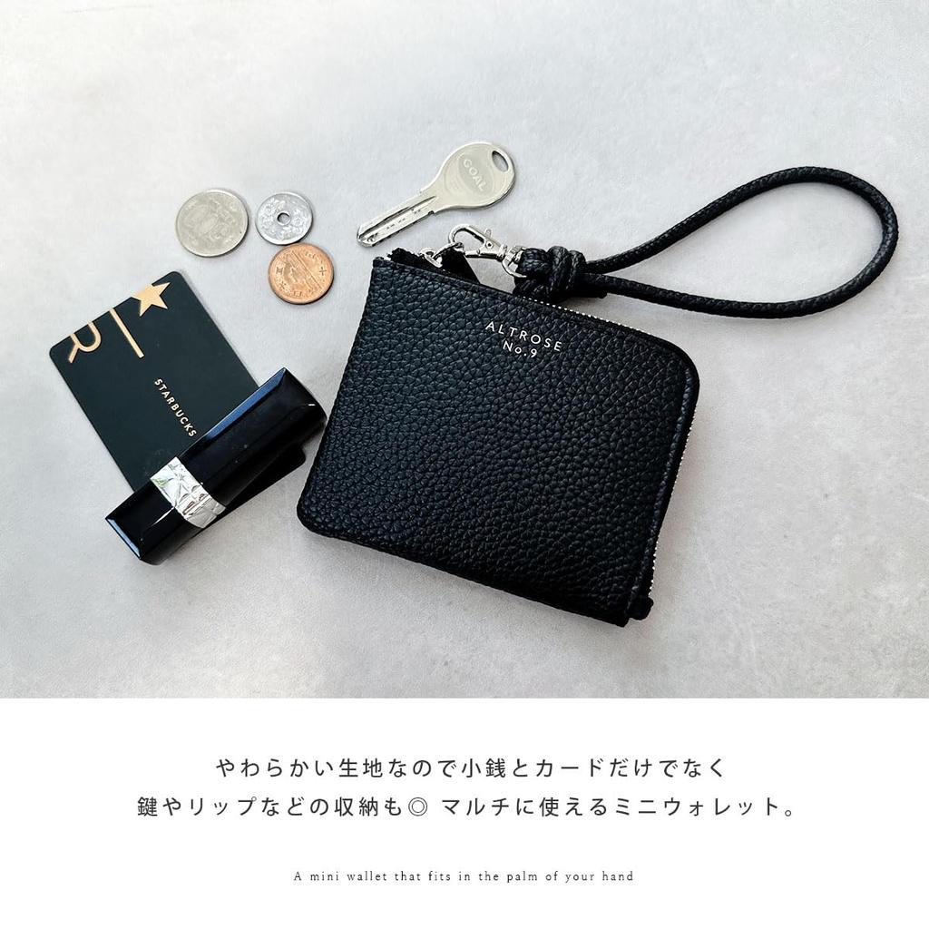 compact wallet with an large and hand strap for easy Slim, L-shaped zipper, capacity, lightweight, access. Women's (Black)