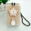 Women's Long Flower Pendant Necklace - Elegant Water Drop Sweater Chain for Autumn/Winter