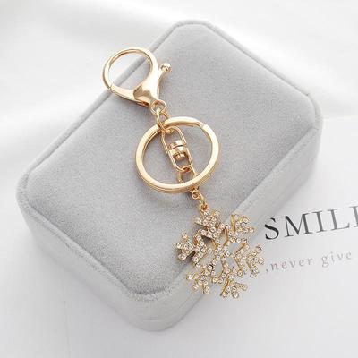 Christmas Snowflake Metal Keychain Set: Exquisite Small Hollow Gold Pendants