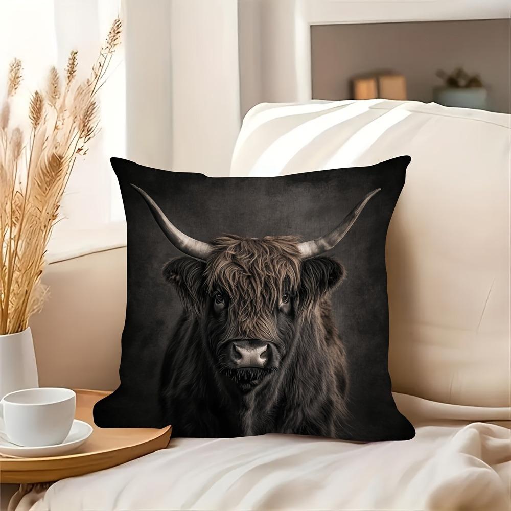1 ultra-soft highland cow pillowcase with a fine highland cow motif on a black background