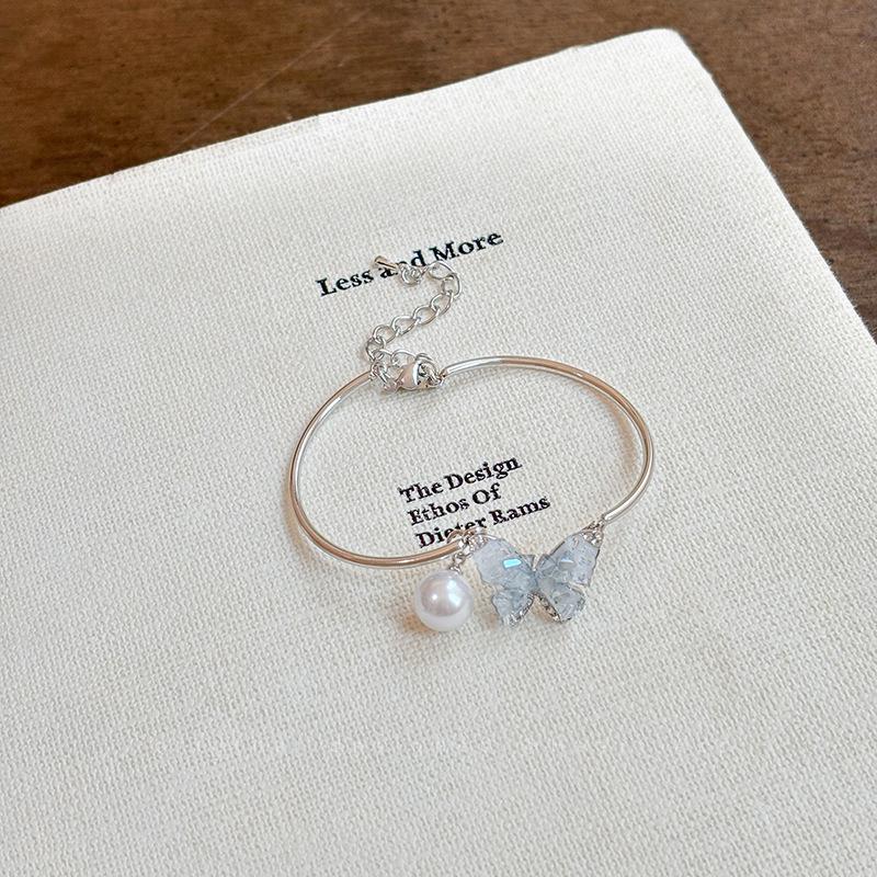 

Женское ожерелье с кисточкой-бабочкой из голубого жемчуга - Приморский стиль, легкая роскошь, чокер-аксессуар