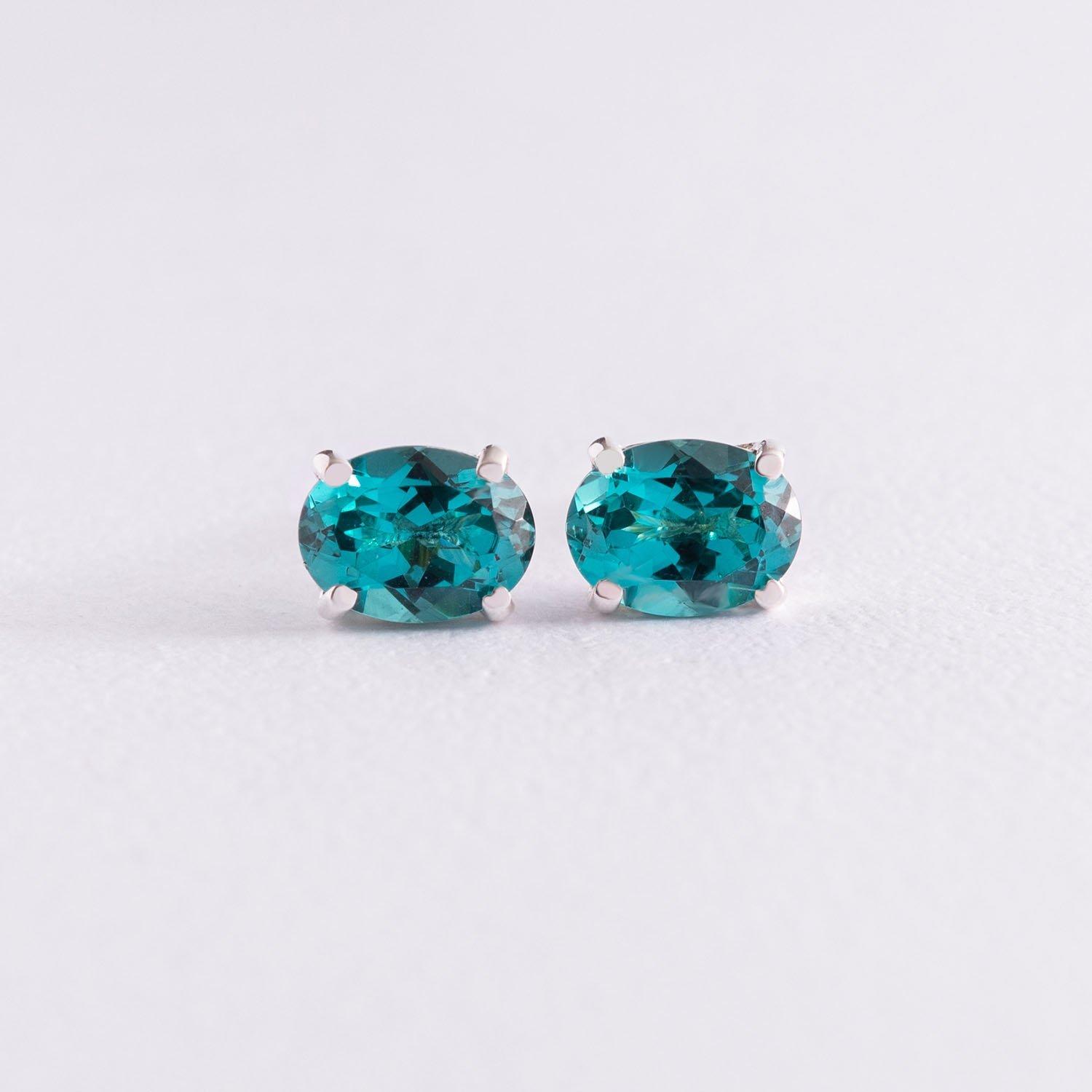 

Срібні сережки з фіанітами.. турмаліном Oniks срібний