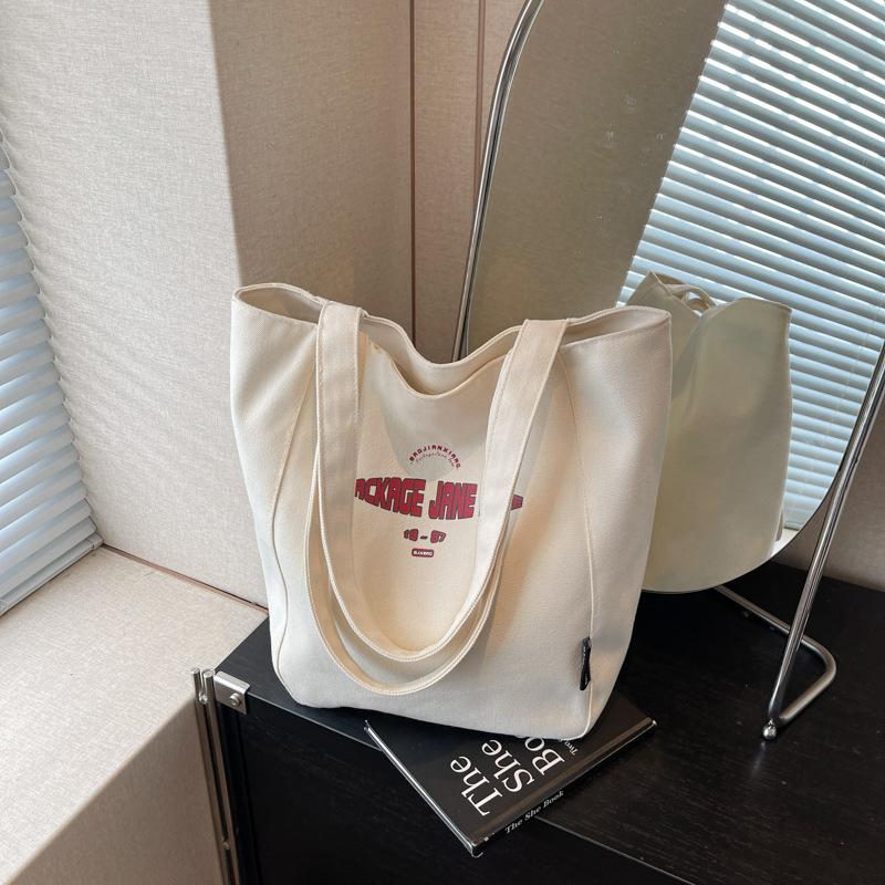 Niche Canvas Bag Women's Large-capacity New Casual Versatile Shoulder Bag Class Commuter Tote Bag