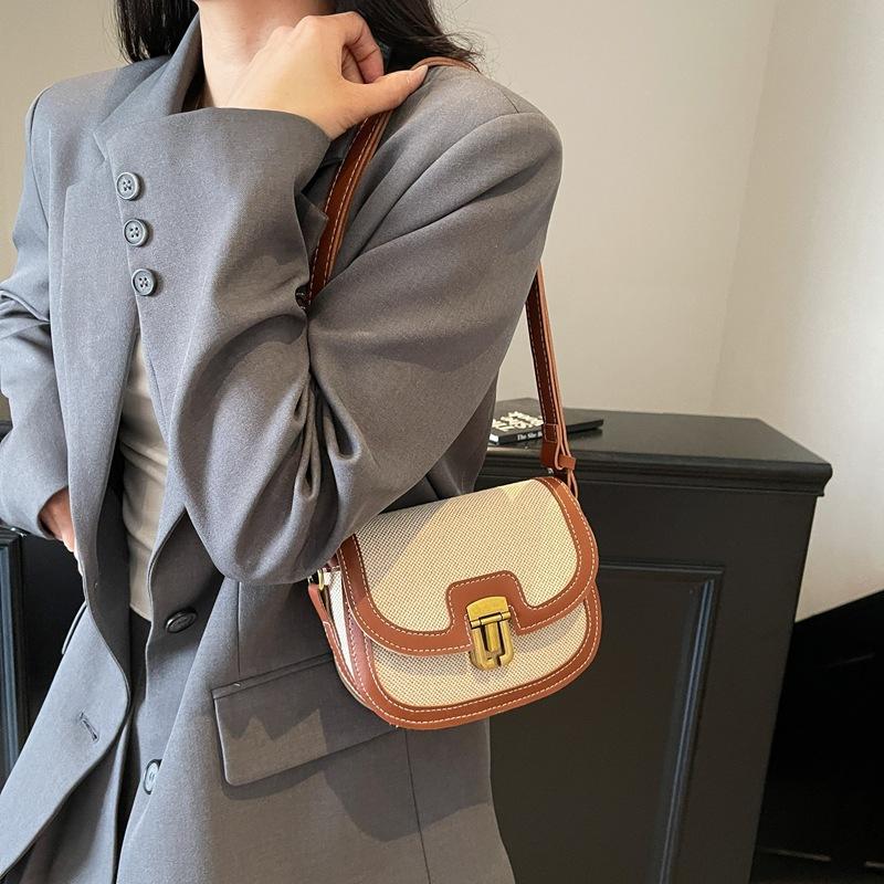 Summer new Korean niche contrasting color shoulder messenger bag fashionable retro saddle bag versatile underarm bag