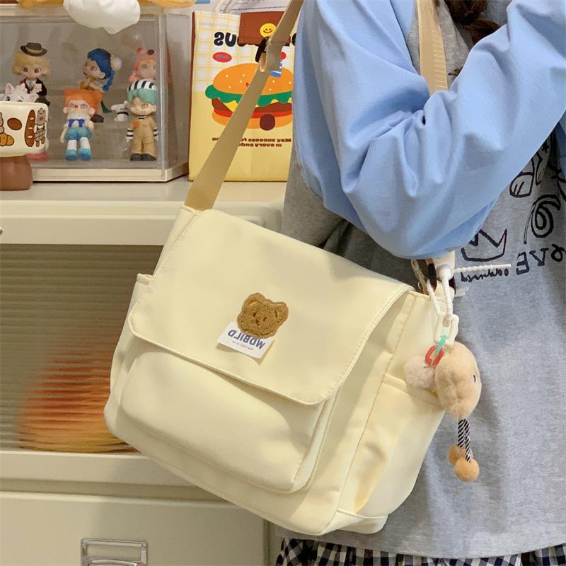 Cute bear messenger bag female ins wind Korean version large capacity shoulder bag junior high school college students class mailman bag tide