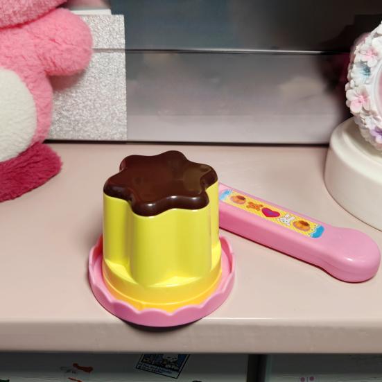 Simuliertes Pudding-Fütterspielzeug mit einziehbarem Löffel Rollenspiel Plüschtier Baby-Puppe Fütterungs-Interaktionsspielzeug Osterkorb-Füller