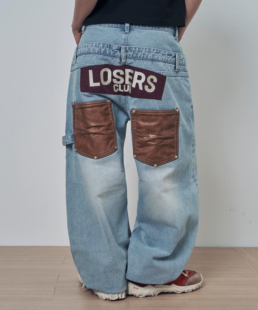 Lujeoseukeulleob Layered Leather Patch Curved Wide Denim Pants Light Blue