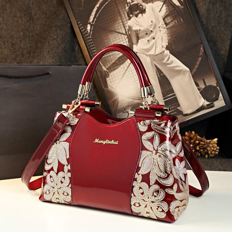 

Новая модная вышитая сумочка бордовый